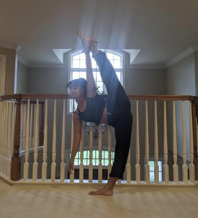 Dance club co-founder Madi Robbs dances at her house.