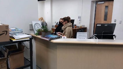 Members of the front office staff enjoy working at their new front desk, which is part of LCHS main office renovation. The school is currently closed to most students, but faculty members work in the new office space, following social distancing protocols. 