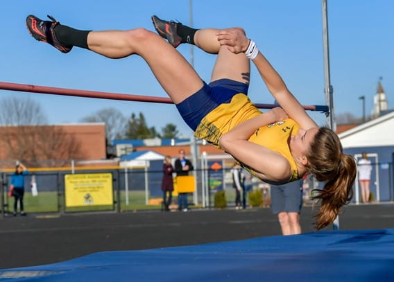 Mckenna Giannos competes in the high jump as a junior during the spring track season 2019. Photo courtesy of John Klimavicz.  

Senior track athlete Mckenna Giannos: “Practice has definitely been different, our workouts have been changed to accommodate that COVID guidelines, which has definitely made it harder to get back into the swing of things, but being able to see and practice with my teammates again makes it all worth it.”

