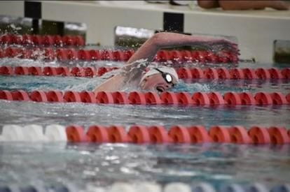 Senior Swimmer Lexi Vanderloo makes her final push towards the finish line. Photo Credit: Caroline Layne, LoCo Sports. 