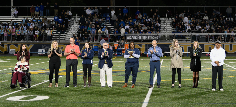 The 2020-2021 Hall of Fame class is recognized at half time against the Tuscarora Huskies at home. 
John Bryant, John Murphy lll, Lawrence Dolby, Adina Trammel, Amanda Arbogast, Marguerite Lewis, Kerry Fur, Shaylin O’Connell, Julie Strange
