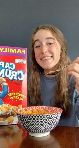 Senior Taylor McCully enjoys a bowl of Captain Crunch cereal before school while showing her support for our new mascot. It has become her favorite cereal brand. 