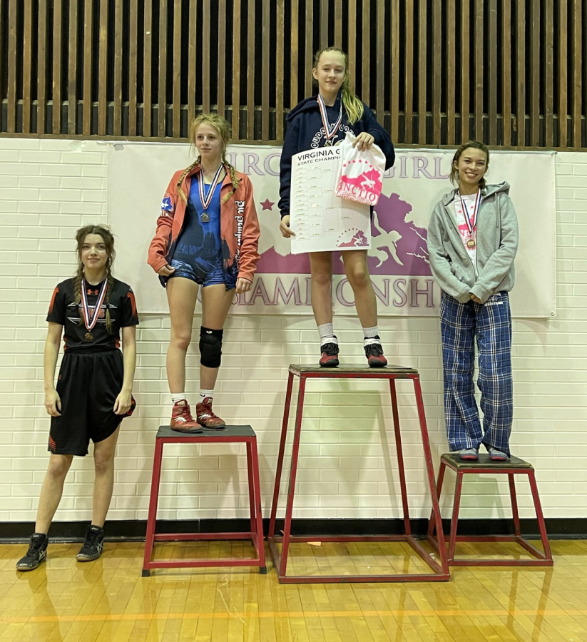 Freshman Grace Roberts wins the Girls State Wrestling tournament on January 26. Roberts became the second female wrestler in school history to win a state championship. Photo courtesy of County Athletics.