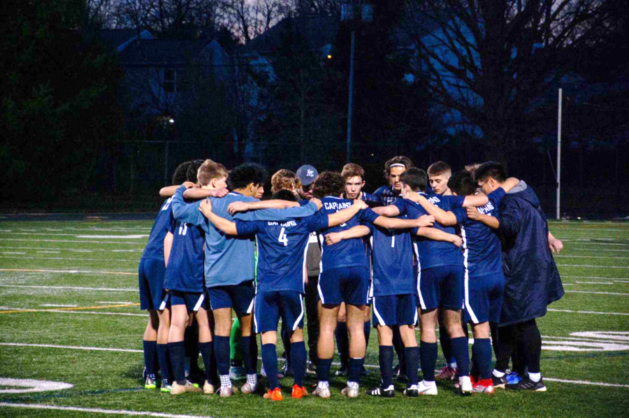 The+Team+huddles+before+an+exciting+match+up+against+Riverside.+Photo+by+Olivia+Powers.%0A