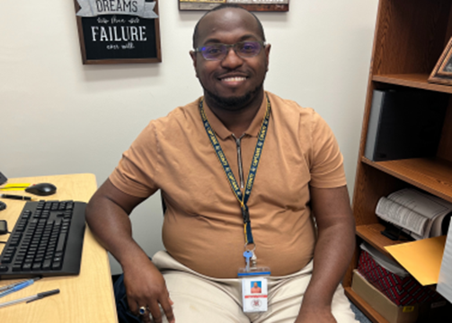 Jarrel Taylor pauses in his office between appointments. Taylor’s duties include making schedule changes, collaborating with parents, and students, so most of his time is spent meeting with students. 