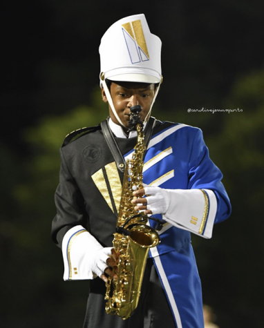 Donovan Claybrooks nails a solo on September 23. The Captain’s football team won 42-14 against Valley, accompanied by the marching band’s performance. 