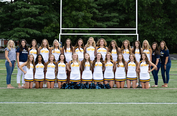 The LCHS varsity cheer team poses for a picture on August 16, 2022.The varsity cheer team usually won 1st place at their competitions. 