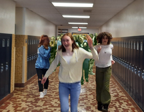 Students and zombies participate in an impromptu race to lighten the dreary mood.