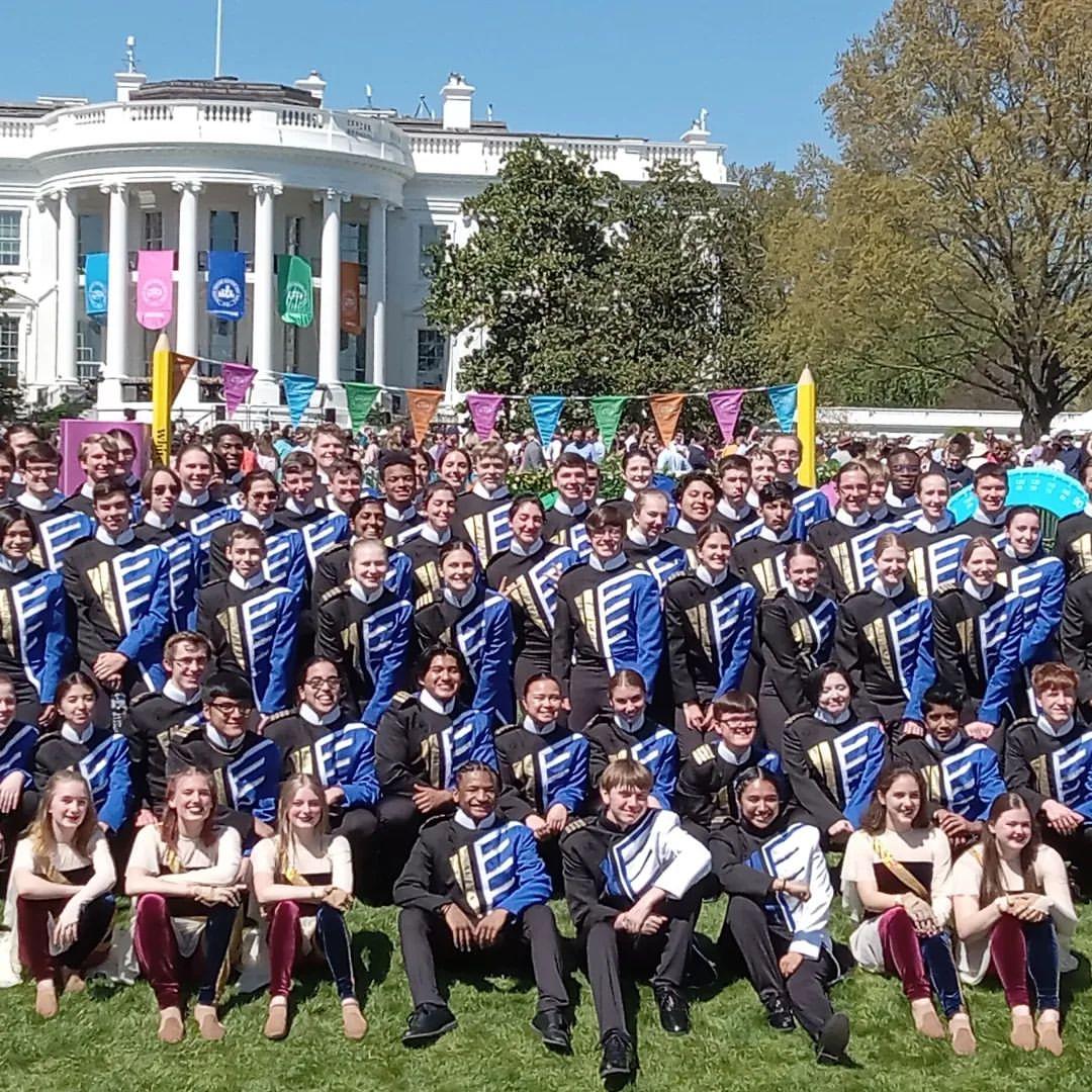 Marching Band standing in front of the white house.