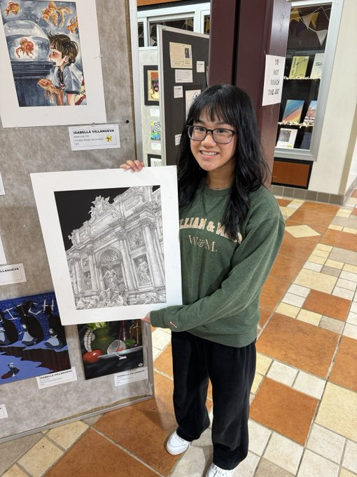 Isabella Villanueva poses with her artwork for the official announcement, which reads, “Isabella’s piece “Trevi Fountain” was selected as the 2024 Principal’s Art Gallery winner.  The artwork will be framed and displayed for future generations to enjoy in the main hallway.”