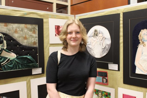 Artist Katherine Garvey, “I’ve always been doing art, my mom is an art teacher, so what else what I be doing?” She says with a laugh, “It feels really good to be here, my art looks much better hung up than in a bag sitting on my floor!” She is in AP Art this year and plans to get her BFA at JMU as well as her teaching license.