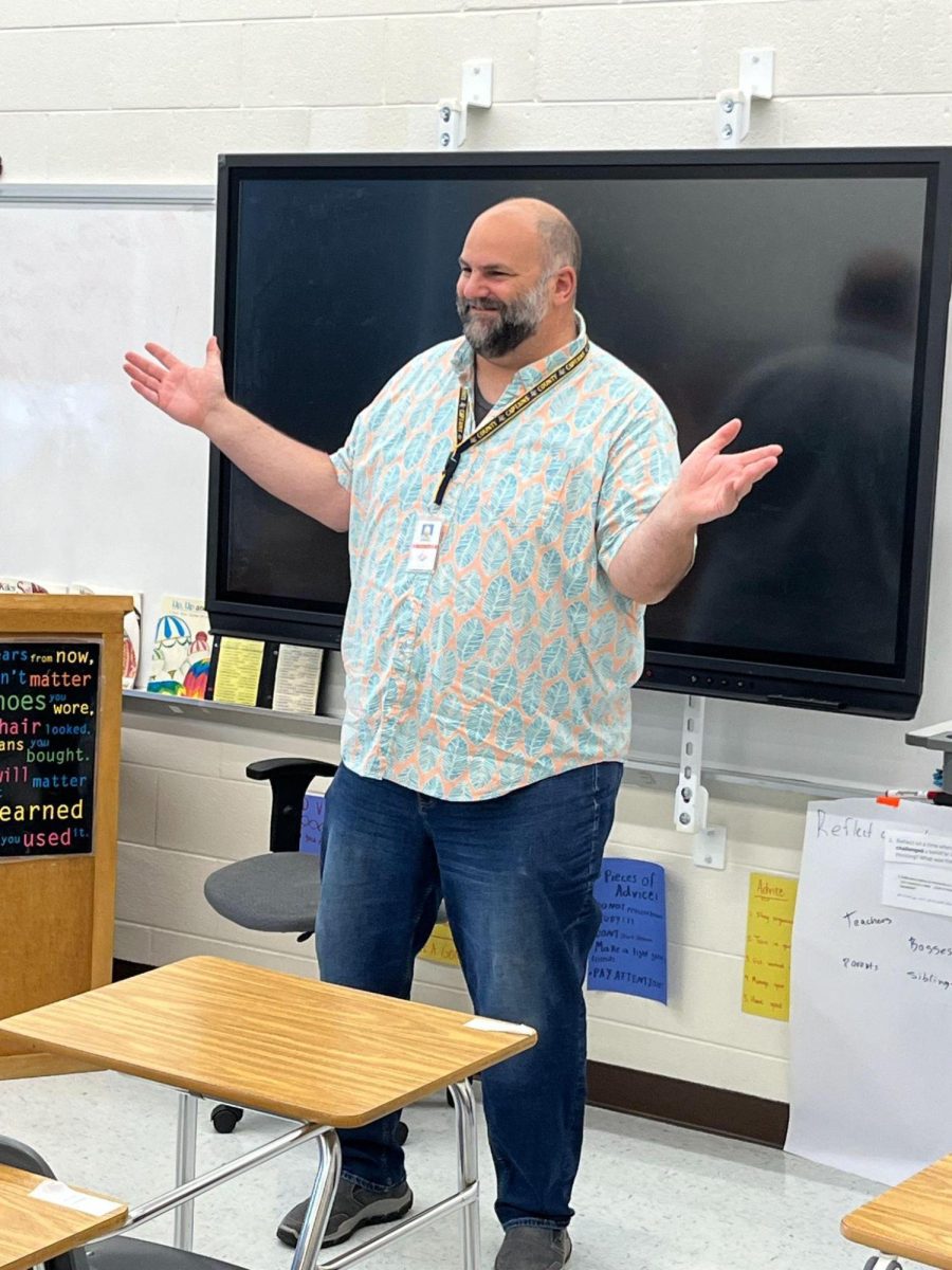 Matthew Gallant teaches a class full of English students. Gallant has had many different professions including jobs in sales, transportation, juvenile detention, and teaching. This is his first year at County. 