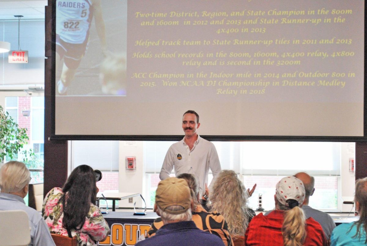 Former athlete Patrick Joseph receives his Hall of Fame award. The Hall of Fame was an event organized by the Athletic department to induct former Athletes. Photograph by Nur Mustafa.