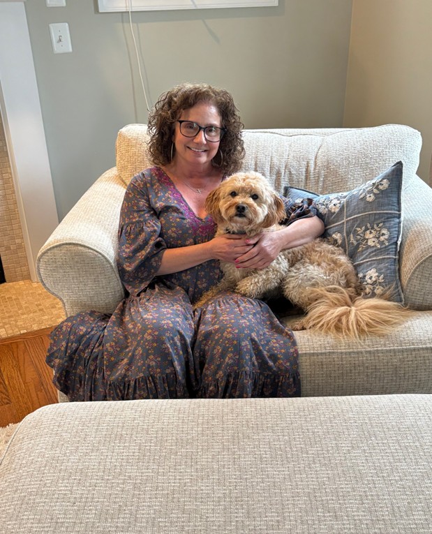 DeGroat poses with her pet dog Grady. When not in school, she partakes in playing with her dog and being with family. Photo courtesy of Laura DeGroat.