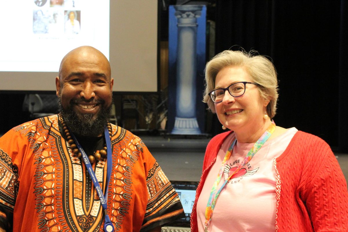 Kevin Grigsby and English teacher Kathryn Ives, who taught Grigsby while attending County, reunite at Grigsby’s presentation. They excitedly greeted each other before he began.